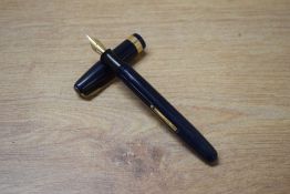 A Waterman 515 lever fill fountain pen in Black with single broad cap band having Watermans 14CT
