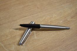 A boxed Parker 45 Flighter converter fill fountain pen with chrome tassie