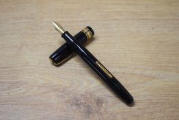 A Waterman W5 lever fill fountain pen in Black with single broad and two narrow cap bands having
