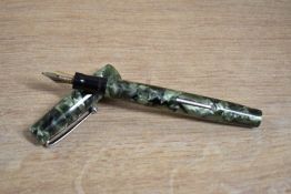 A boxed Mabie Todd & Co Blackbird lever fill fountain pen Green marble having Blackbird 14CT MT&Co