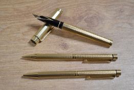 A Sheaffer Targa 1009 Barleycorn converter fill fountain pen, ballpoint pen and pencil set