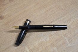 A Wyvern 660 lever fill fountain pen in Black with a broad and two narrow cap bands having a 14K