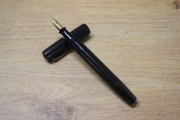 A Summit S75 lever fill fountain pen in Black engine turned design having Summit 14CT Gold nib.