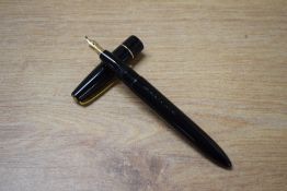 A Mabie Todd & Co Blackbird button fill fountain pen in black with single narrow cap band having