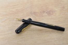 An un named lever fill fountain pen in chaised Black Hard Rubber having Warranted 14CT 1st Quality 2