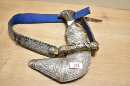 A fine 19th-century Omani white metal khanjar ceremonial dagger, with an animal horn handle,