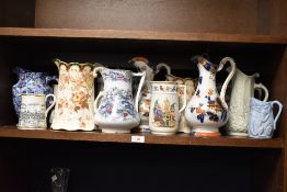 A selection of 19th to early 20th century ewers/jugs, to include a pair of Minton Porcelain ware ivy