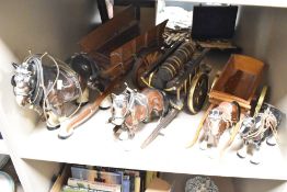 A group of four mid 20th century Melba Ware Shire horses and wooden cart figurines featuring leather