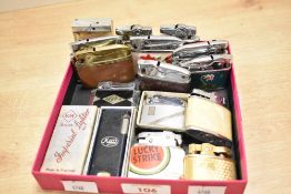 A quantity of 20th-century clipper lighters, to include an Evans pocket petrol lighter featuring