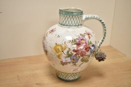 A mid 20th-century German Ulmer Keramik pottery ewer, of bulbous form, with a handle and flared rim,