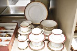 A 1983 Royal Albert bone china Paragon 'Holyrood' tea and dinnerware set, featuring a rich