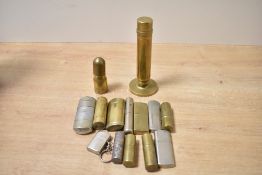 A quantity of early 20th-century WW2 British Army brass and metal petrol lighters; sold with a WW2