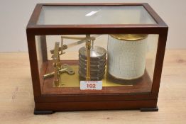 A late 19th to early 20th-century Negretti and Zambra (founded 1850) mahogany-cased barograph,