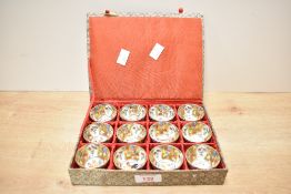 A group of twelve 20th century Chinese porcelain zodiac miniature cups, each cup depicting one of