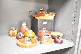 A quantity of 20th-century wooden table lighters, to include both Rolstar and Ronson examples,