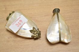 Two Victorian mother-of-pearl shell scent/snuff bottles, both with white metal fittings, one example