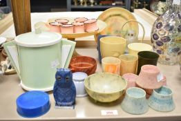 An interesting collection of 1930's/40's bakelite, to include a Cadburys Bournvita cup, mottled