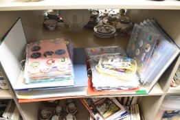 An extensive collection of pin badges, various to include children's cartoon characters, Popeye,