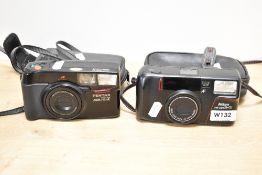 Two compact cameras. A Nikon TW Zoom 35-70 and Pentax Zoom 70-X