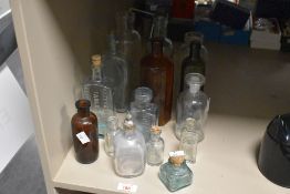 A quantity of 20th century glass bottles to include 'Day Son & Hewitts' chemical extract, 'Kutnow'