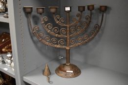 An early 20th-century German Arts and Crafts wrought iron ‘Goberg’ seven-branch Menorah-style