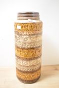 A tall mid-20th-century West German ceramic floor vase, featuring a moulded pattern of