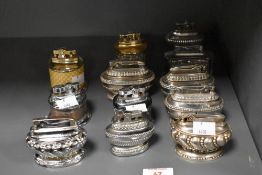 A quantity of 20th-century metal table lighters, to include three Ronson 'Queen Anne'; a Ronson '