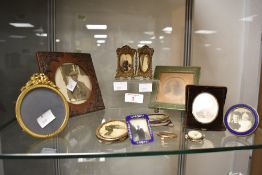 A quantity of 19th to early 20th-century photograph frames, to include a double sided marriage frame