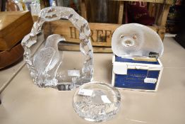 A group of three 20th century Mats Jonasson (1945-) lead crystal paperweights featuring bald