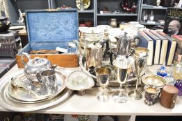 A large quantity of 20th century silver-plated ware to include teapots, coffee pot, cutlery and