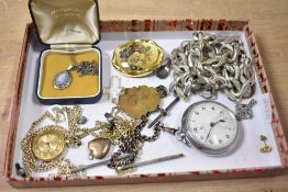 A small assortment of costume jewellery, including a large statement chain, a shield medallion and