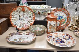 A group of 20th century Oriental porcelain to include bowls, plates and a coffee pot all featuring