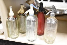 A group of five vintage soda ciphens including Clinning and Ormond of Blackpool, Hooper Strude and