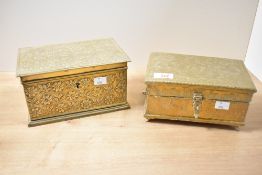 Two late 19th to early 20th-century embossed brass boxes, both featuring delicate foliate and floral