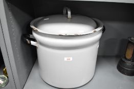 A large vintage porcelain enamel stockpot with lid, featuring a light grey finish, unmarked,