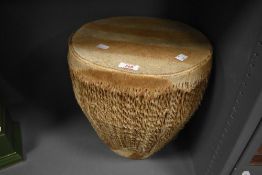 A large early 20th-century zebra skin African tribal embuutu double sided drum, unmarked, 37cm,