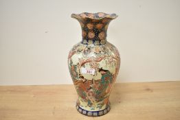 An early 20th-century Japanese Satsuma-style porcelain vase, of baluster form with a scalloped