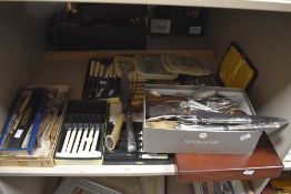 A selection of mixed stainless steel and silver plated flatware and cutlery, six sets being cased/