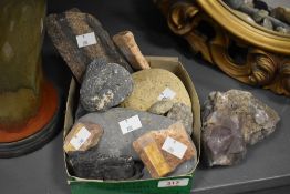 A selection of assorted natural rocks and mineral specimens, including raw, more natural examples,