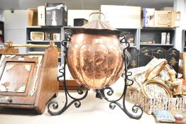 A Victorian Arts & Crafts copper and wrought-iron coal bucket, of globular fluted form with