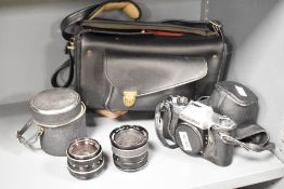 A Rolleiflex SL35 camera body with a Carl Zeiss Planar 1,8 50mm lens, a Derek Gardner Automatic 1: