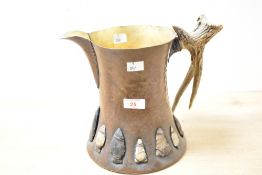 A large early 20th-century American Arts and Crafts Silver and Hammered Copper tankard attributed to