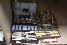 A selection of mixed flatware and cutlery, various including two large fiddle pattern basting