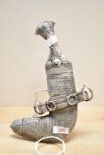 A 19th-century Omani white metal Khanjar ceremonial dagger, featuring intricate white metal mounts