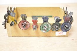 A small quantity of early 20th-century metal Christmas tree candle holders, featuring small clips to