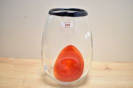 A large mid to late 20th-century Lithuanian Svaja 'Red Orchid' glass vase, featuring a red organic