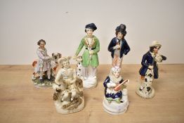 A quantity of 19th-century Staffordshire pottery figures, to include a double-sided Gin and Water