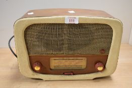 A vintage Pye P117 'Piper' AM/FM valve radio, featuring a bakelite case, 30cm x 20cm, condition is