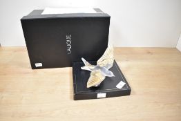 A 20th-century French Lalique Crystal Hirondelles Swallow Wall Ornament, featuring gold-stamped