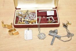 A 1976 silver St Christopher medallion pendant, along with a silver ingot pendant and a small